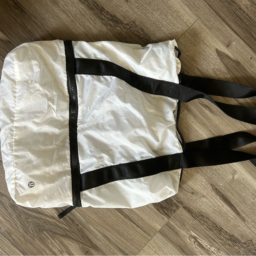 White lululemon bag black zipper